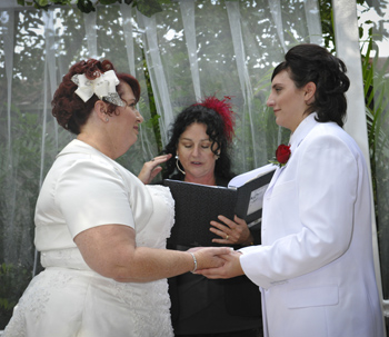 Maria & Sally from Mackay had their Commitment Ceremony at the Mt Ommaney Hotel Apartment's Wedding Garden in West Brisbane with Marilyn Rainbow Pride Celebrant Marilyn Verschuure